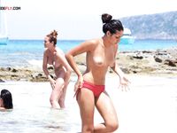 The soft light of the golden hour enhancing the natural glow of a bare body.