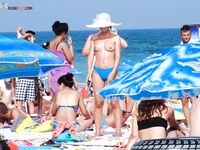 Feeling the raw energy of the sun while relaxing in a state of total nudity. 3