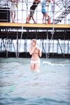 Topless Beach Stand in Patterned Bikini Bottoms by the Sea
