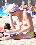 She Wades Out of Turquoise Shallows in Red Side-Tie Bikini Bottoms