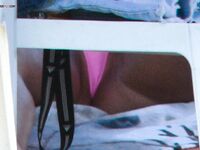 A lady enjoying the calm of a secluded bay in a topless fashion.