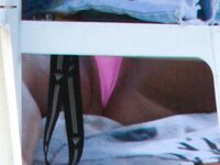 A lady enjoying the calm of a secluded bay in a topless fashion.