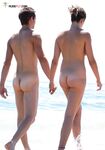 The simple life: bare feet in the sand and the sun on a topless, relaxed chest. 4