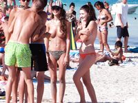 A lady finding her own rhythm with the tide at a clothing-optional beach. 5
