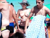Woven Sun Hat and Mirrored Shades on a Topless Beach