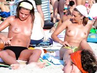 The sensation of the salt air and sun on a bare, topless figure. 4
