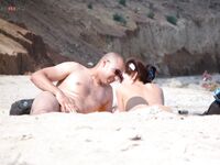 The freedom of a long summer walk on a beach where clothes are not needed.