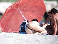 Capturing the authentic spirit of freedom at a local clothing-optional beach. 4