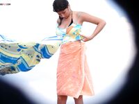 The artistic appeal of a sun-drenched body at a naturist retreat. 2