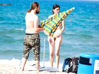 Portraits of a woman who feels empowered by the freedom of a topless summer. 2