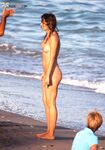 The liberating feeling of the warm Mediterranean air on bare skin during a midday stroll. 2