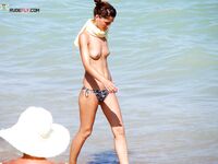 The liberating feeling of the warm Mediterranean air on bare skin during a midday stroll. 2