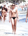 Walking the Shoreline Topless in Black Bikini Bottoms