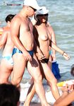The sensation of the salt air and sun on a bare, topless figure. 5