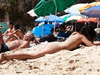 The sensation of the salt air and sun on a bare, topless figure. 5