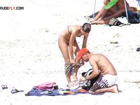 They started to play some beach tennis and I pressed play on my camera.