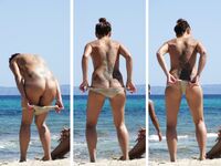 A Souvenir Photo Moment on the Open Nude Beach Sand