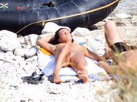 Out of the Shallow Surf on a Brazilian Nudist Beach Shore