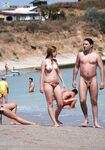 Orange Bikini Bottoms and Wet Skin Stepping Onto a Topless Beach