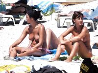 A lady relaxing on a wooden pier in a state of total freedom and nudity. 6