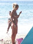 Walking the Shoreline Topless in Pink Bikini Bottoms