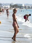 Walking the Shoreline Topless in Pink Bikini Bottoms