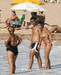 Walking the Shoreline Topless in Pink Bikini Bottoms