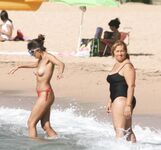 Walking the Shoreline Topless in Pink Bikini Bottoms