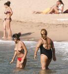 Walking the Shoreline Topless in Pink Bikini Bottoms