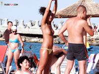 The natural glow of a woman who spends her summer days topless by the sea. 3