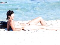 Candid portraits of a woman who finds peace in the freedom of a clothes-free holiday. 2