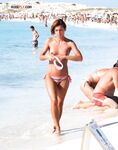 From Turquoise Shallows Onto Open Nude Beach Sand