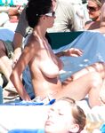 From Turquoise Shallows Onto Open Nude Beach Sand