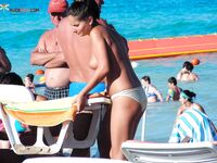 . The beauty of a natural tan being earned at a local nude beach. 2