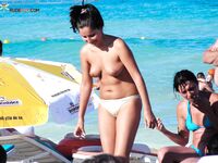 . The beauty of a natural tan being earned at a local nude beach. 2