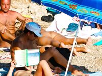 sunny beach coastal visitor in seaside sunlight