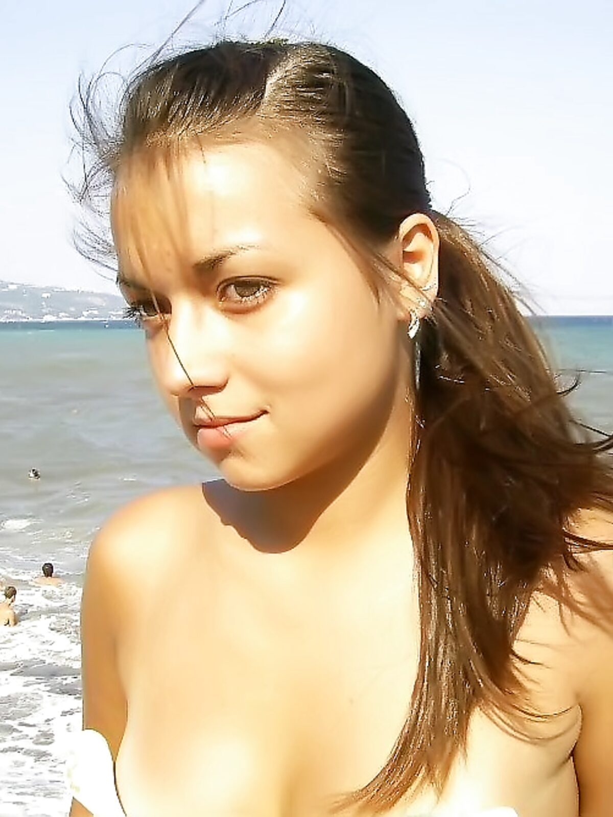 Topless Sunbathing With the Ocean Stretching Behind Her album preview