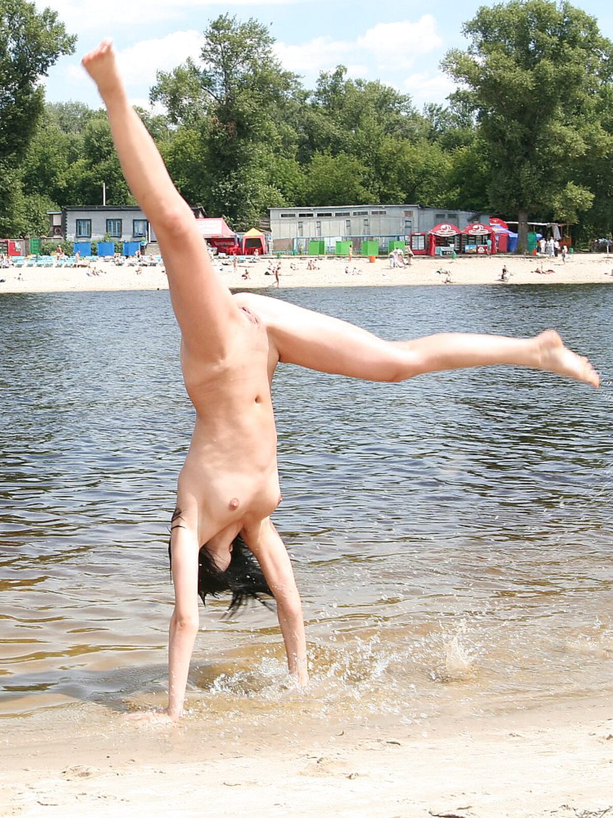 Handstand on the Sand With Beachgoers in the Distance album preview