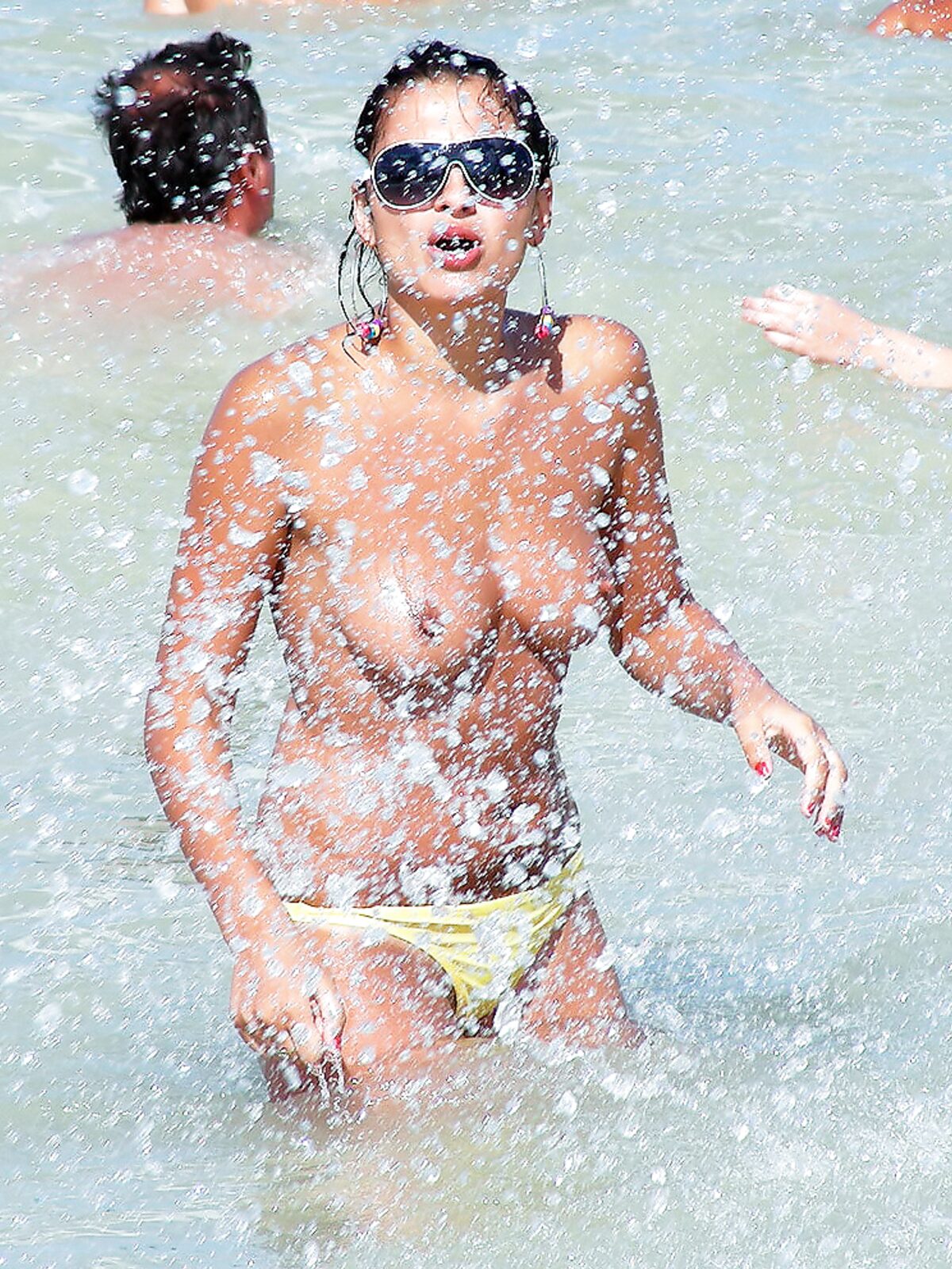 Blonde topless nudist woman enjoys her time at a nudist camp with her titties out 2 album preview