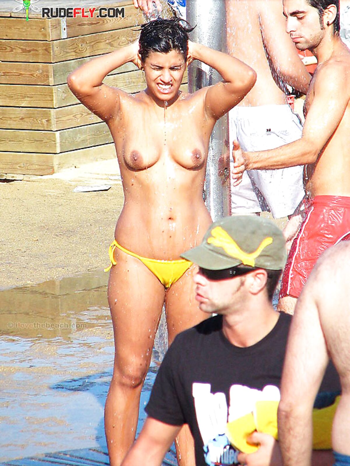 Artful photography of a woman enjoying the freedom of a clothes-free holiday. album preview
