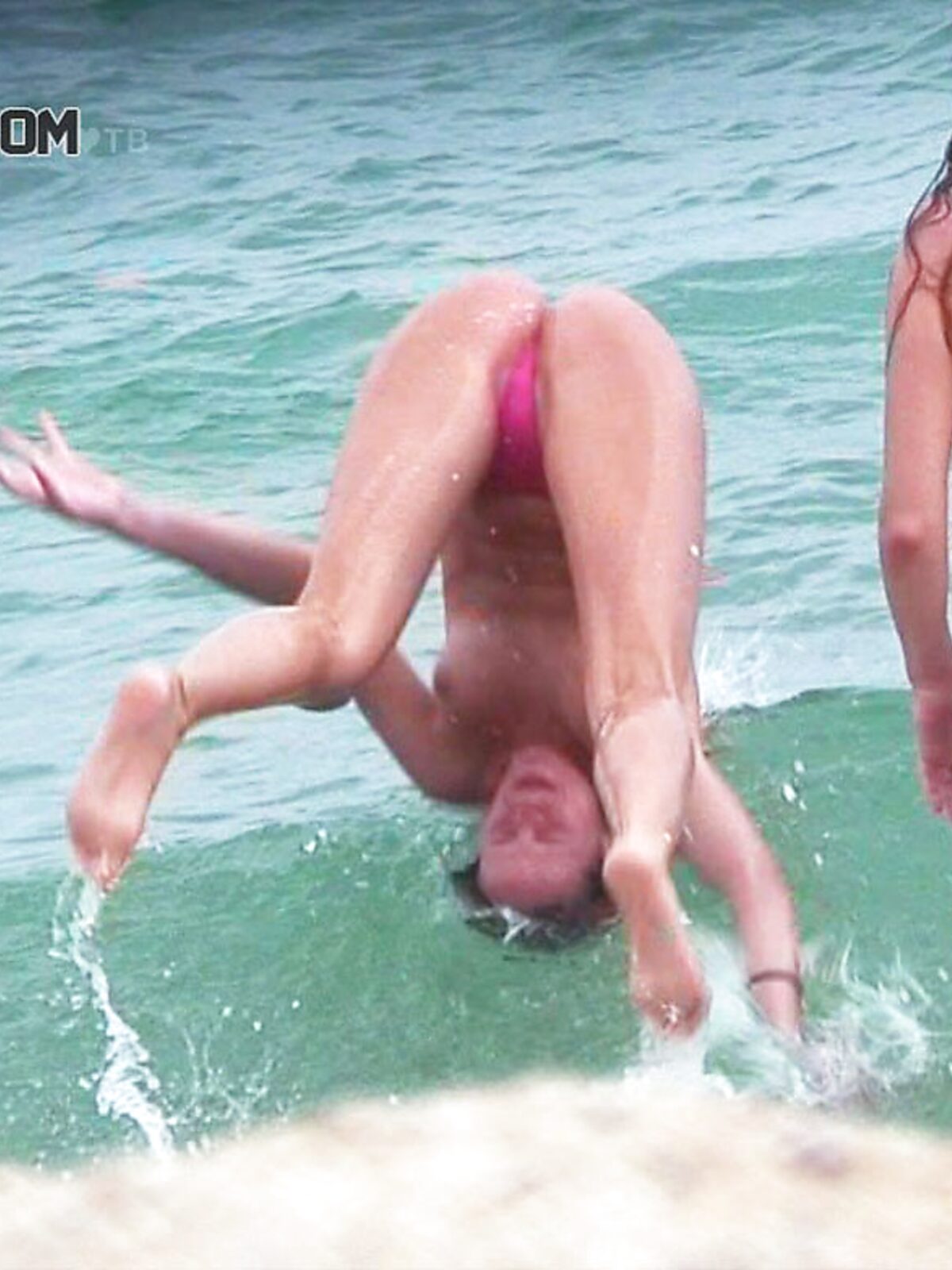 A Headfirst Dive Into the Waves in Pink Bikini Bottoms album preview