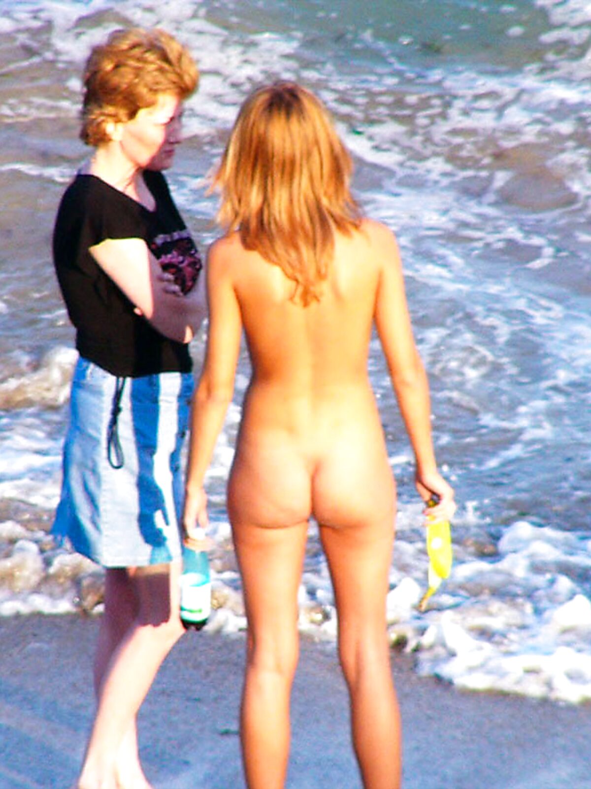Denim Skirt and Long Hair on Wet Sand Beside Breaking Surf album preview