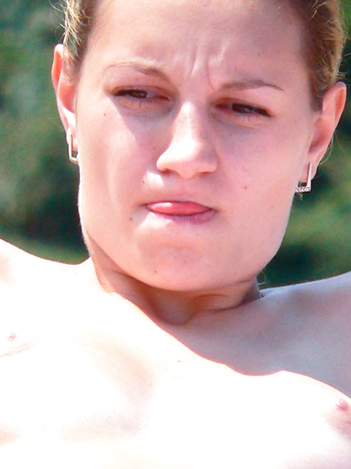 Achieving the perfect tan without boundaries at a scenic and quiet topless-friendly spot. album preview