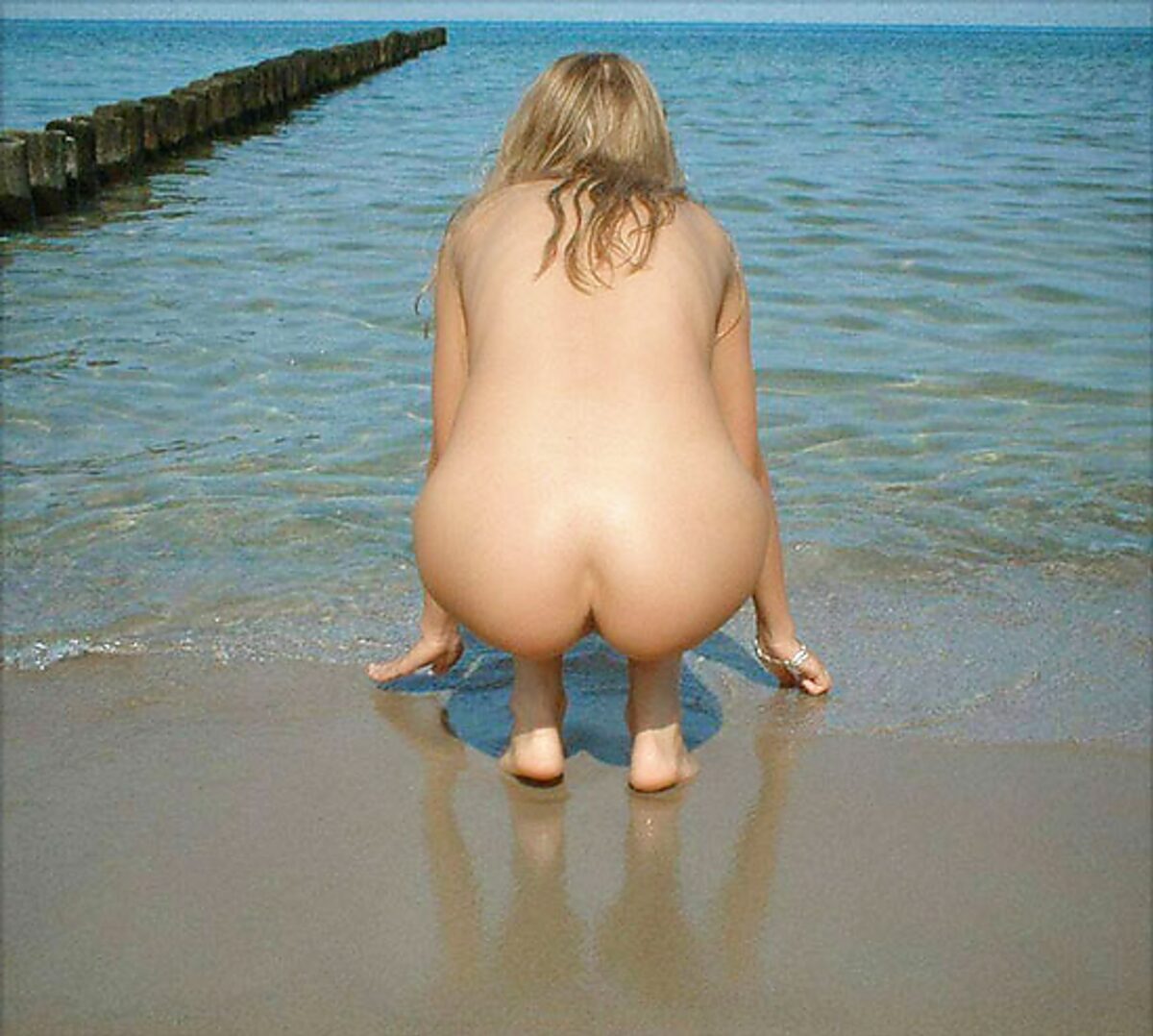 Crouching at the Water's Edge Beside a Long Wooden Groyne album preview