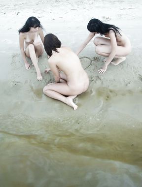 Tracing Shapes Together Where Wet Sand Meets the Shoreline