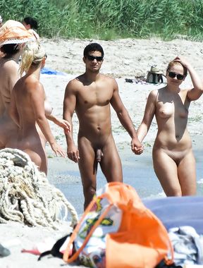 Stunning naturist blonde secretly filmed by a voyeur sitting and sunbathing topless 2