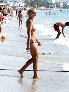 Walking the Shoreline Topless in Pink Bikini Bottoms